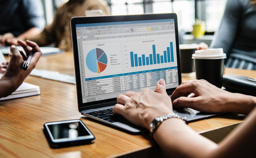 Computer screen with graphs, charts and data